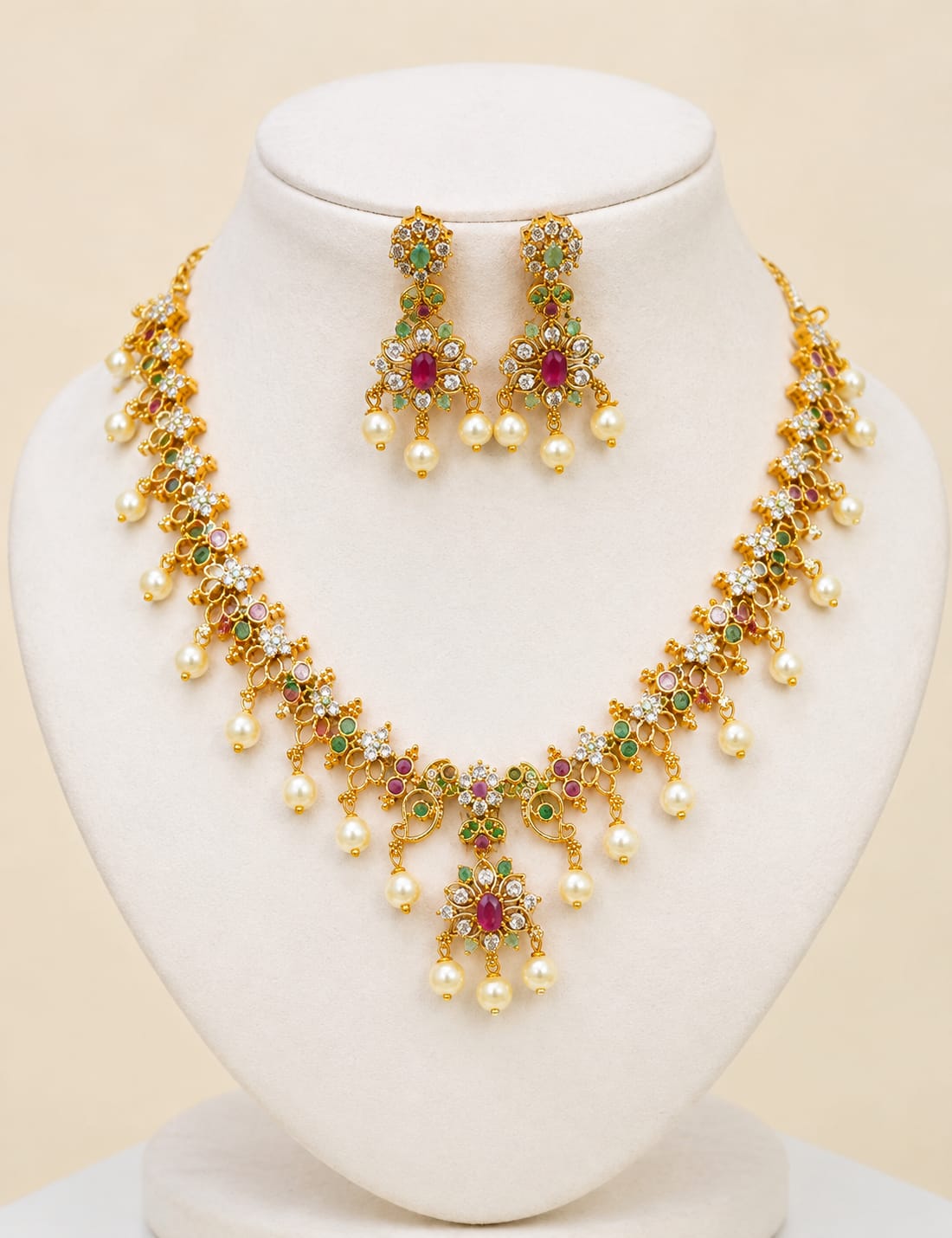 Gulrukh traditional gold jewelry set with green pink gemstones and pearl drop necklace and earringsGulrukh traditional gold jewelry set with green pink gemstones and pearl drop necklace and earringsGulrukh traditional gold jewelry set with green pink gemstones and pearl drop necklace and earrings